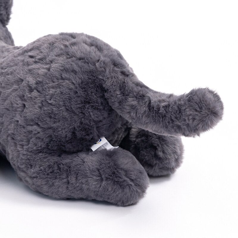 Jiji the Fluffy Black Cat Plushie Laying Down - Image 10